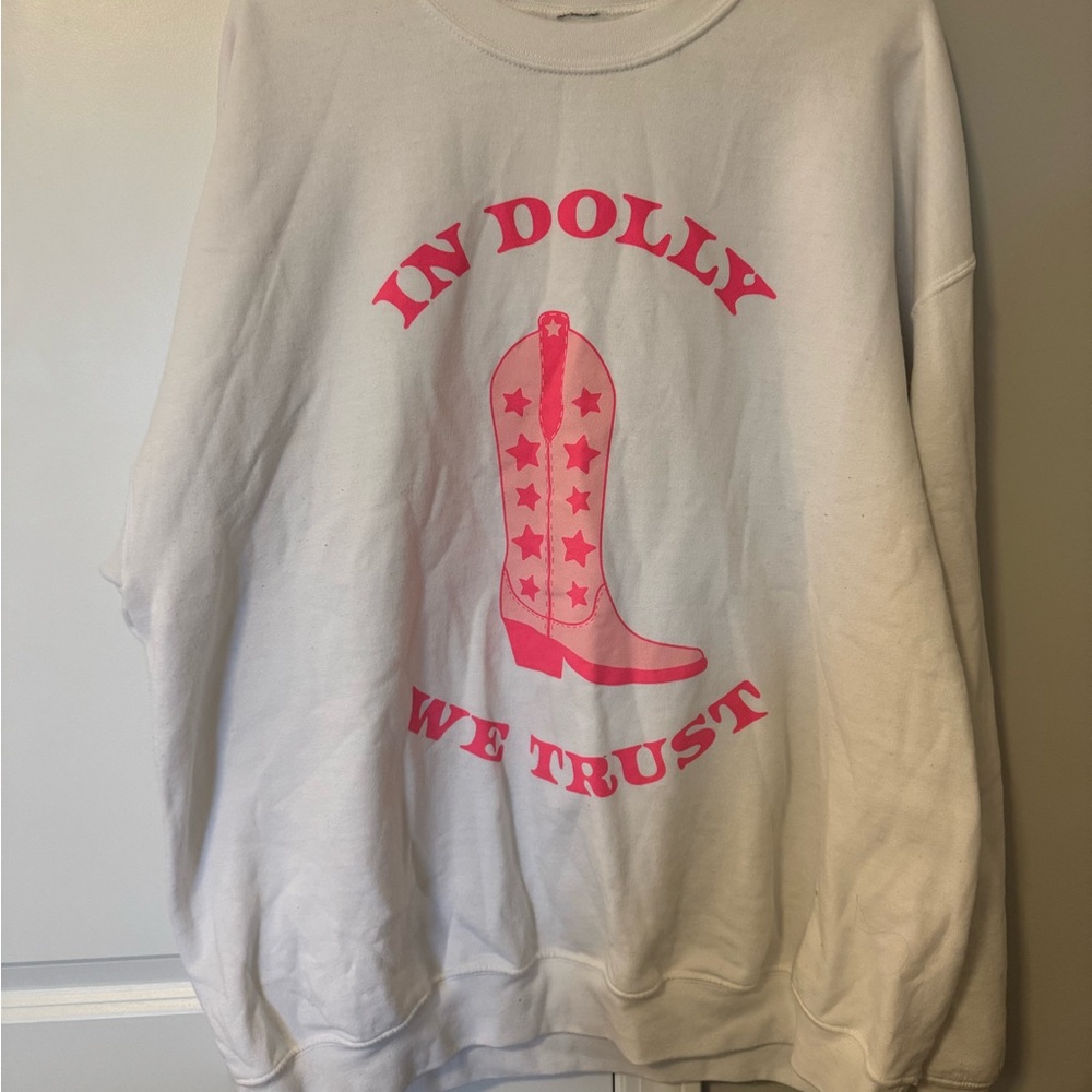 White Sweatshirt with Pink 'In Dolly We Trust' Boot Graphic